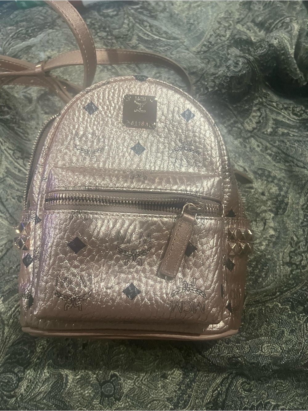 MCM Metallic Rose Gold Mini Backpack with Black Logo Diamonds